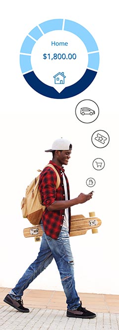Photo of a young man walking with backpack and skateboard looking at his phone
